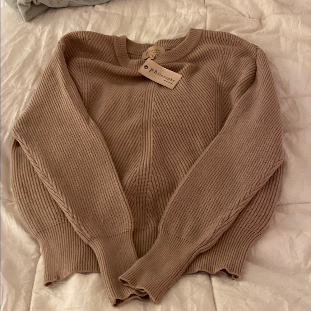 light brown sweater